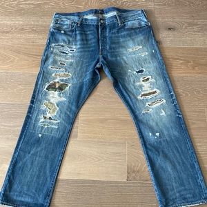 Classic polo denim jeans with camo patchwork and ripped jeans.